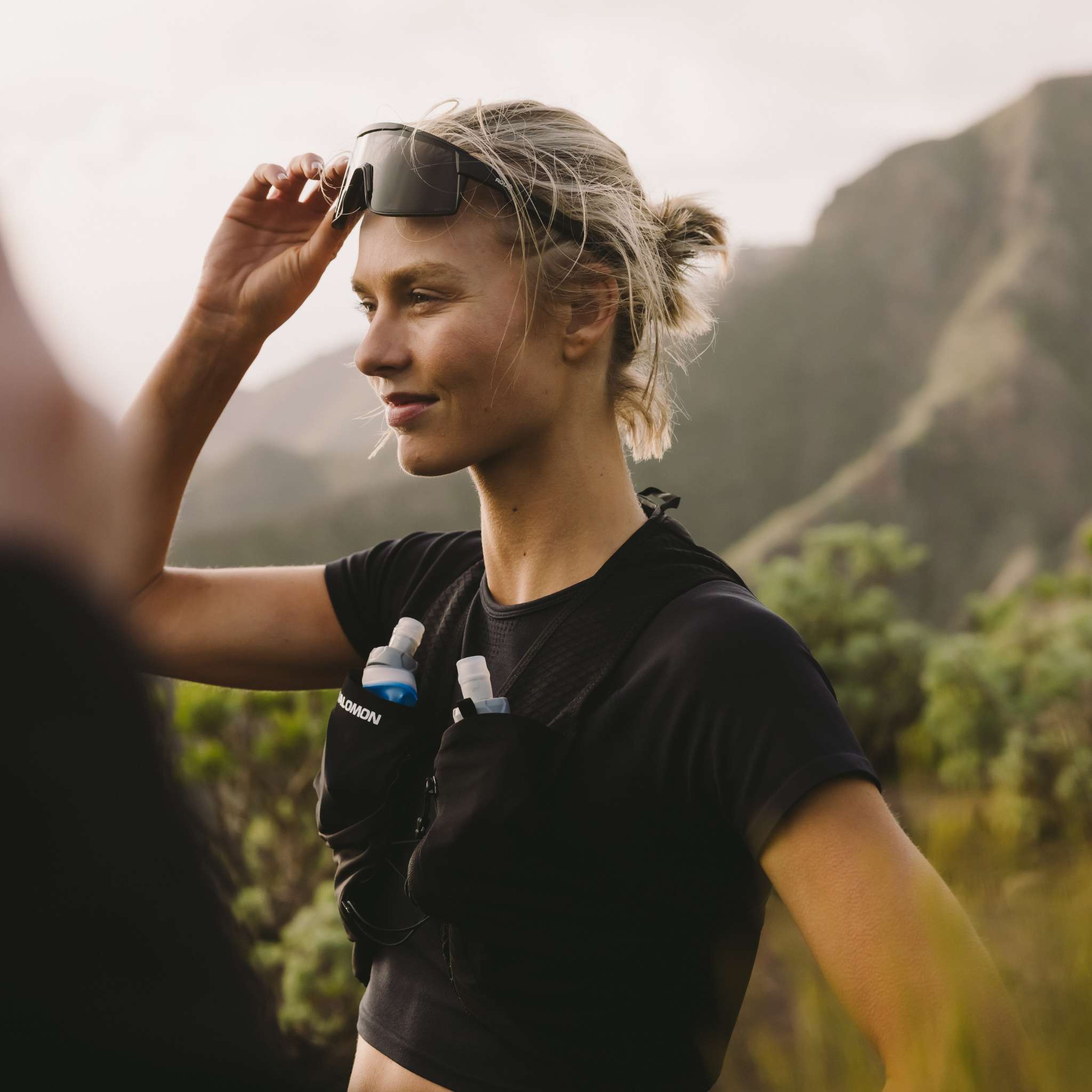 Woman wearing  hydration pack