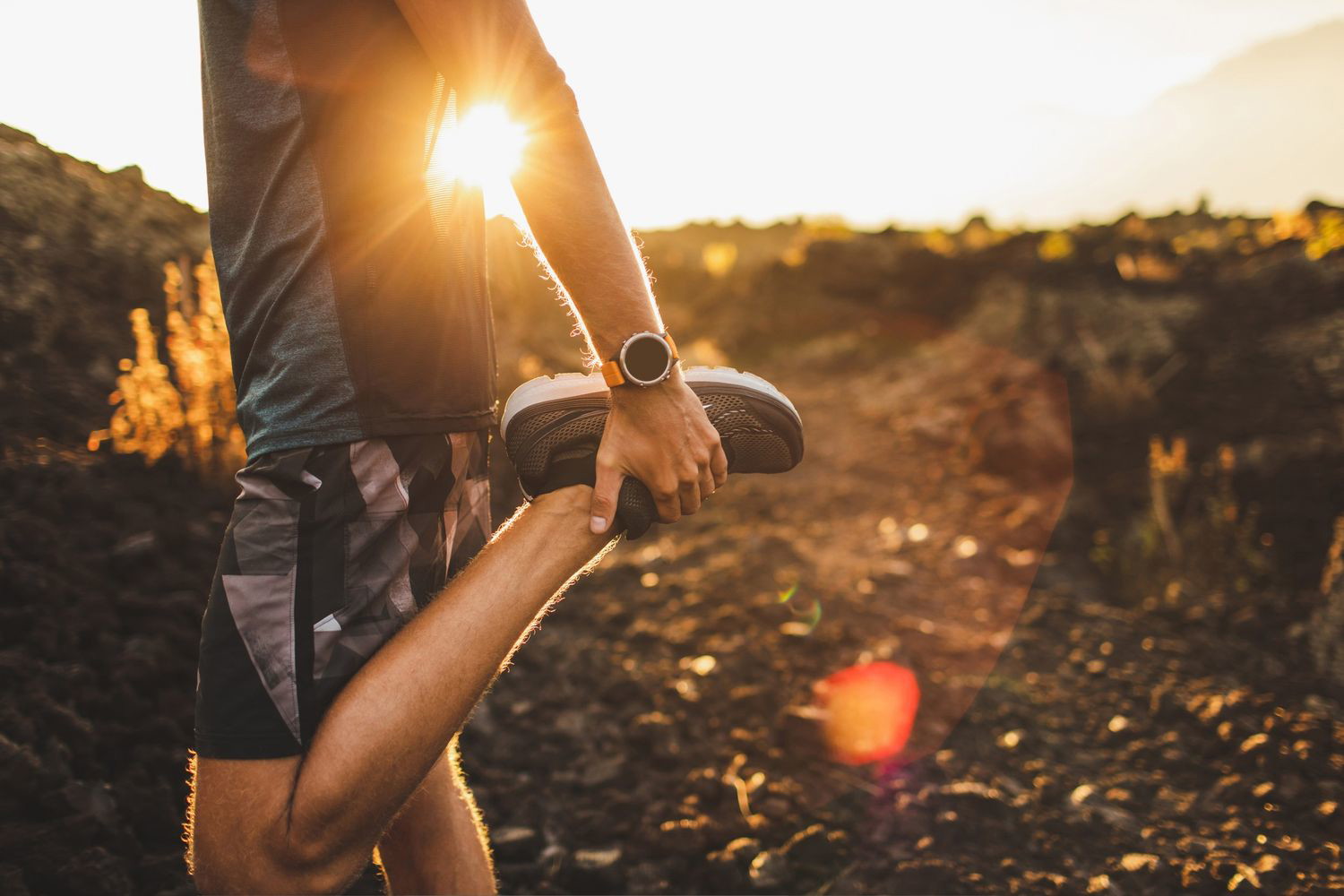 Men streching before fell running