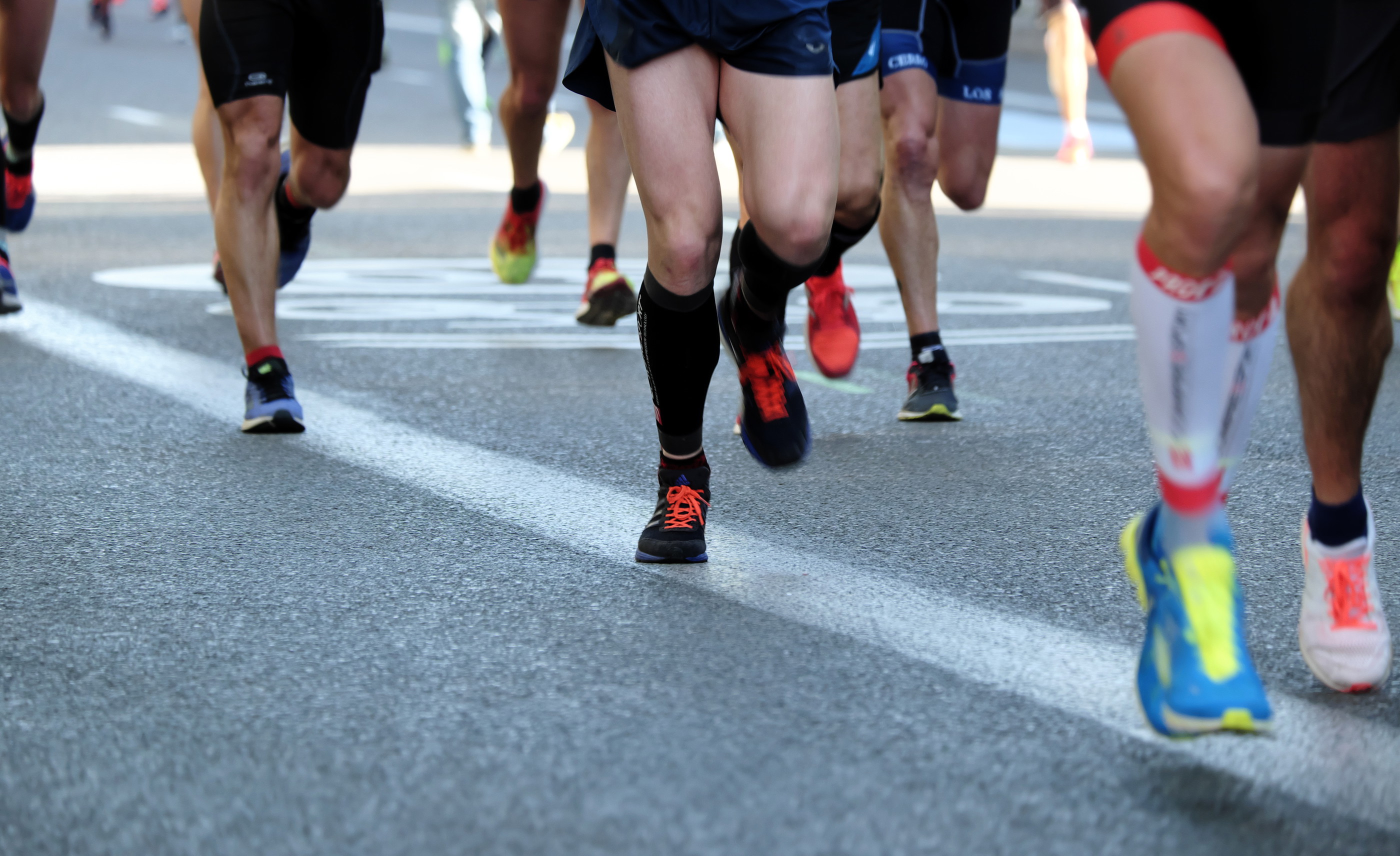 An image of a group of people running in the Edinburgh marathon