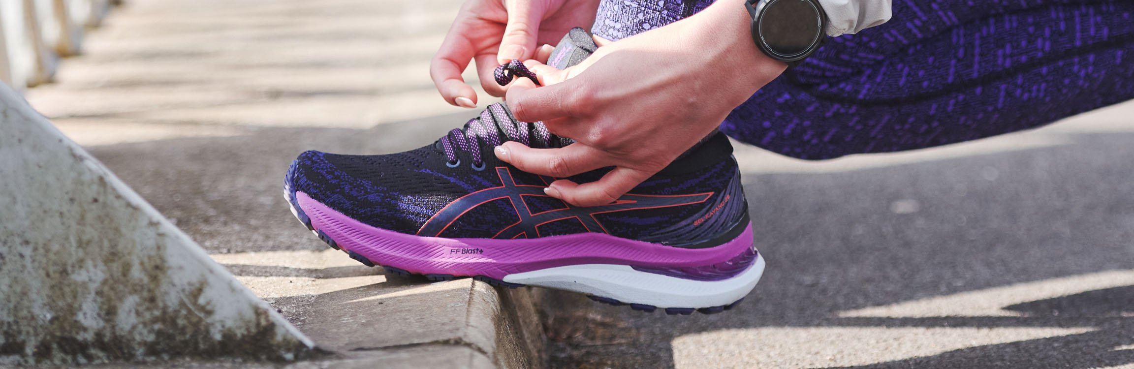 A man running in blue wide fit running shoes
