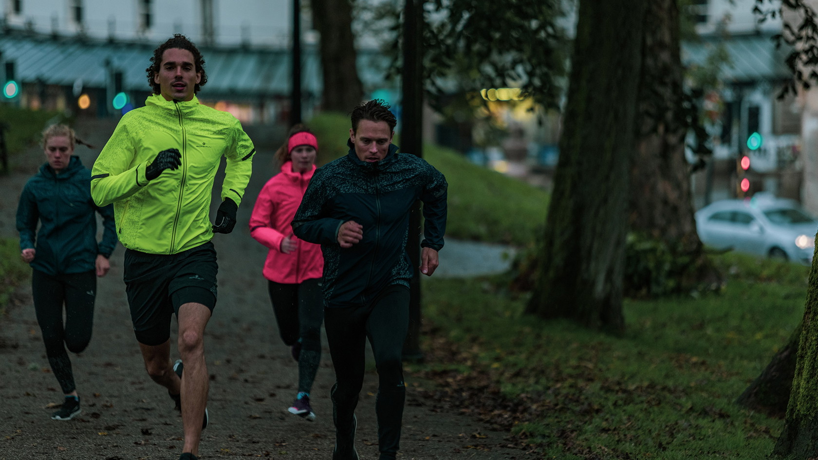 Friends running in the winter