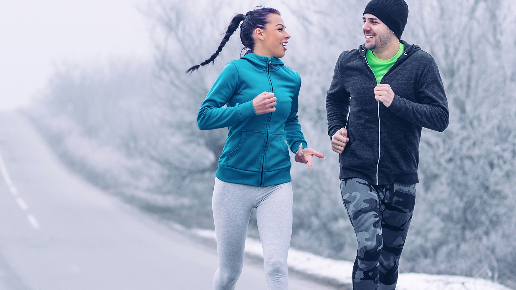 Friends running in the winter