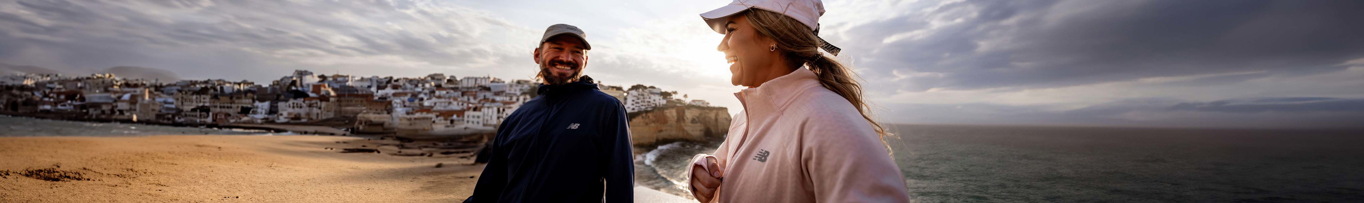 two people laughing before a run